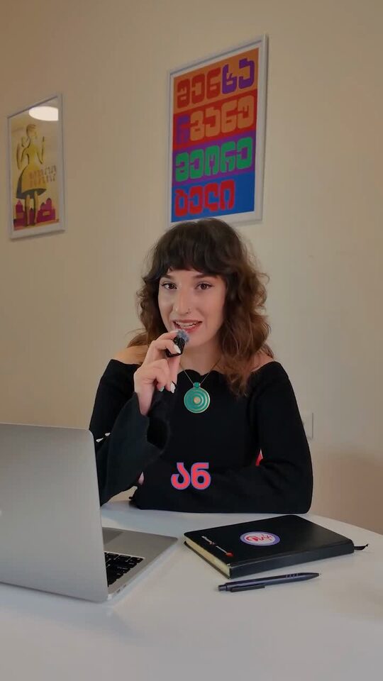 Talking to camera at the office